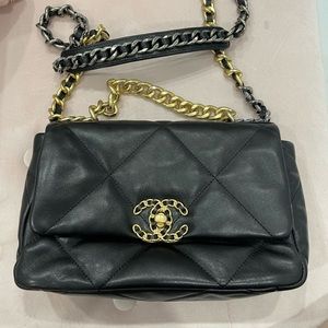 Beautiful black crossbody/ top handle bag , with dark red interior.